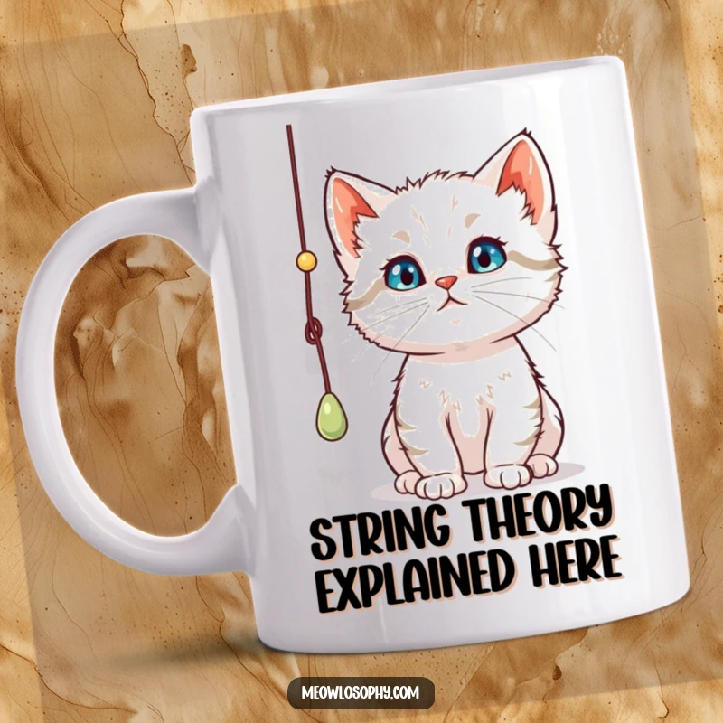Funny curious kitten mug, captivated by a dangling string, showing deep thought and playful intent, a delightful gift idea.