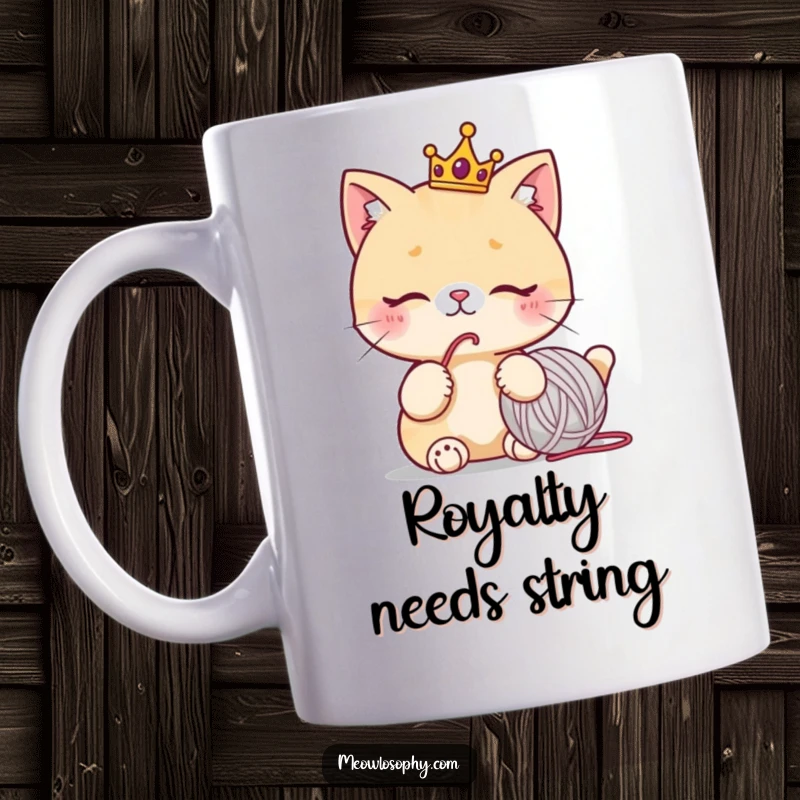 Funny cat mug with a cute character wearing a tiny crown, thoughtfully staring at a yarn ball, perfect for cat moms.