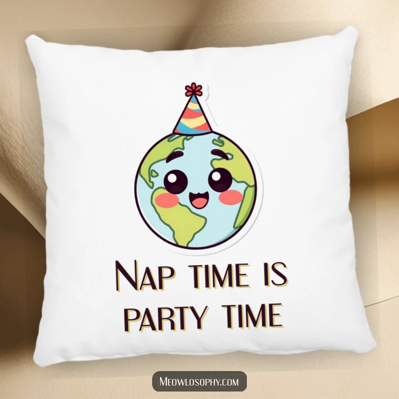 Funny decorative pillow with a stylized earth character sporting a party hat, looking happy and surprised, perfect for cozy comfort.
