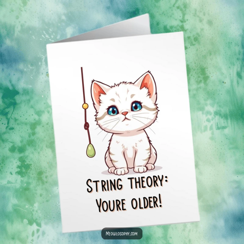 Funny Free Printable Birthday Card: A curious kitten intently bats at a dangling string with a deeply thoughtful and slightly mischievous expression.
