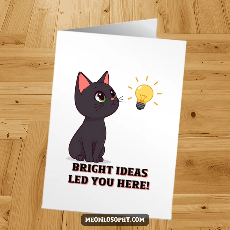 Funny Free Printable Congratulations Card: Black cat has a brilliant idea symbolized by a floating lightbulb, a unique downloadable gift.