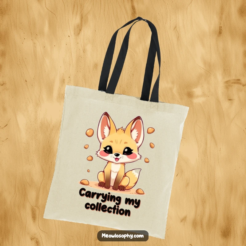 Funny tote bag with a mischievous fennec fox juggling desert pebbles, a playful accessory for daily use.