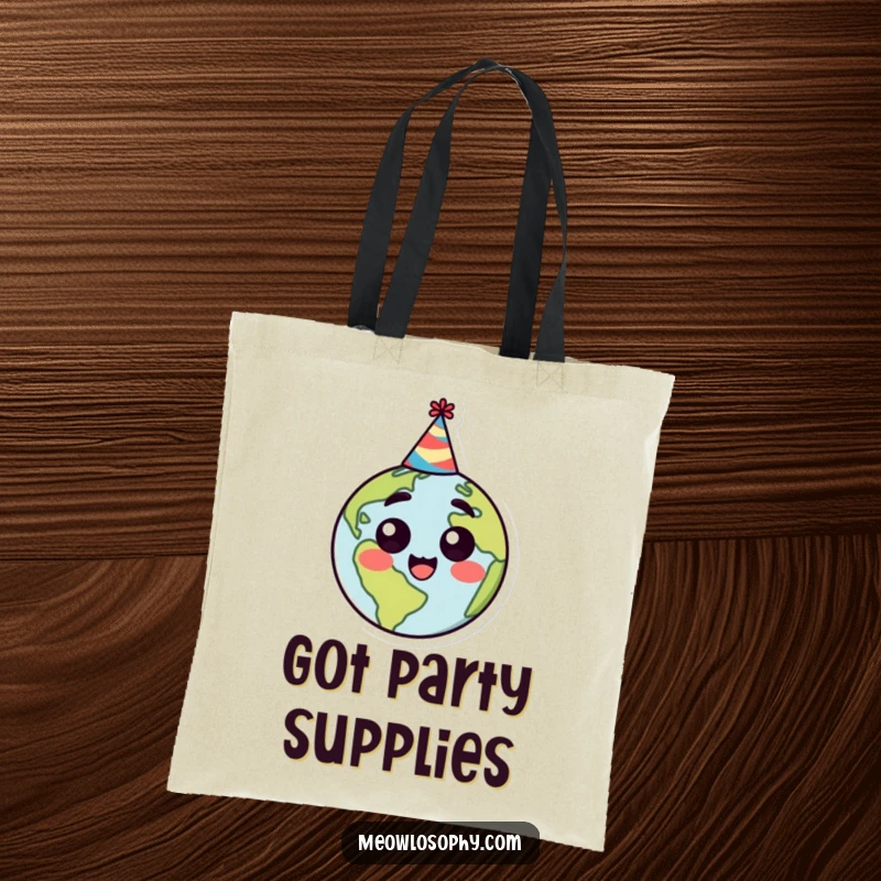 Funny tote bag featuring a stylized earth character in a party hat, radiating happy surprise and ready for celebration.